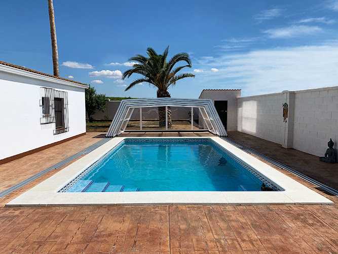Fotografia tomada fuera de Tecnyvan - Cubiertas para Piscina - Empresa de instalación de cubiertas en Pozuelo de Alarcón, Madrid