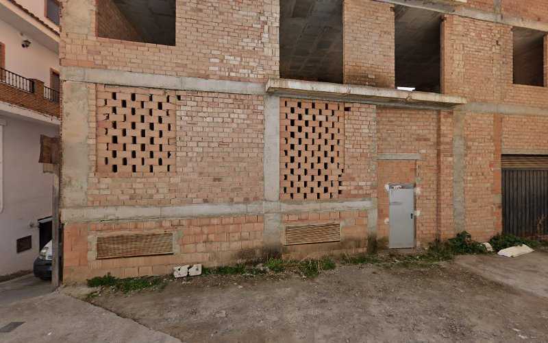 Fotografia tomada fuera de CARPINTERIA MUÑOZ QUIROS - Proveedor de materiales de construcción en Güejar Sierra, Granada
