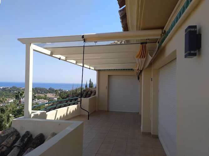 Fotografia tomada fuera de Pvc Aluminios Y Cristaleria Florido Navarrete - Carpintería en Alhaurín de la Torre, Málaga