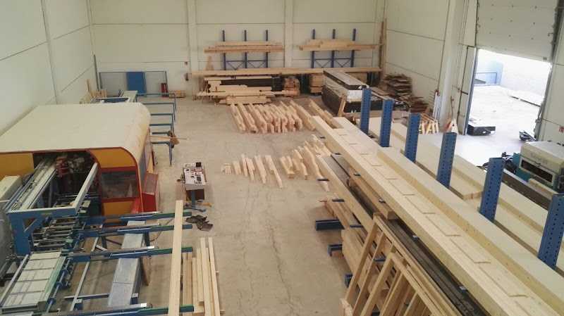 Fotografia tomada fuera de FUSTECH -CASES DE FUSTA ECOLOGICA - Empresa maderera en Quart, Girona