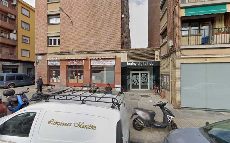 Fotografia tomada fuera de Puertas El Pilar - Carpintero en Zaragoza, Zaragoza